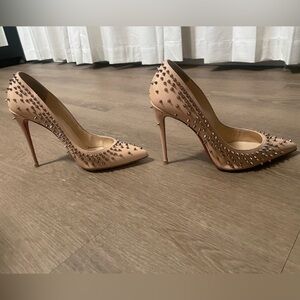 Christian Louboutin - red bottoms